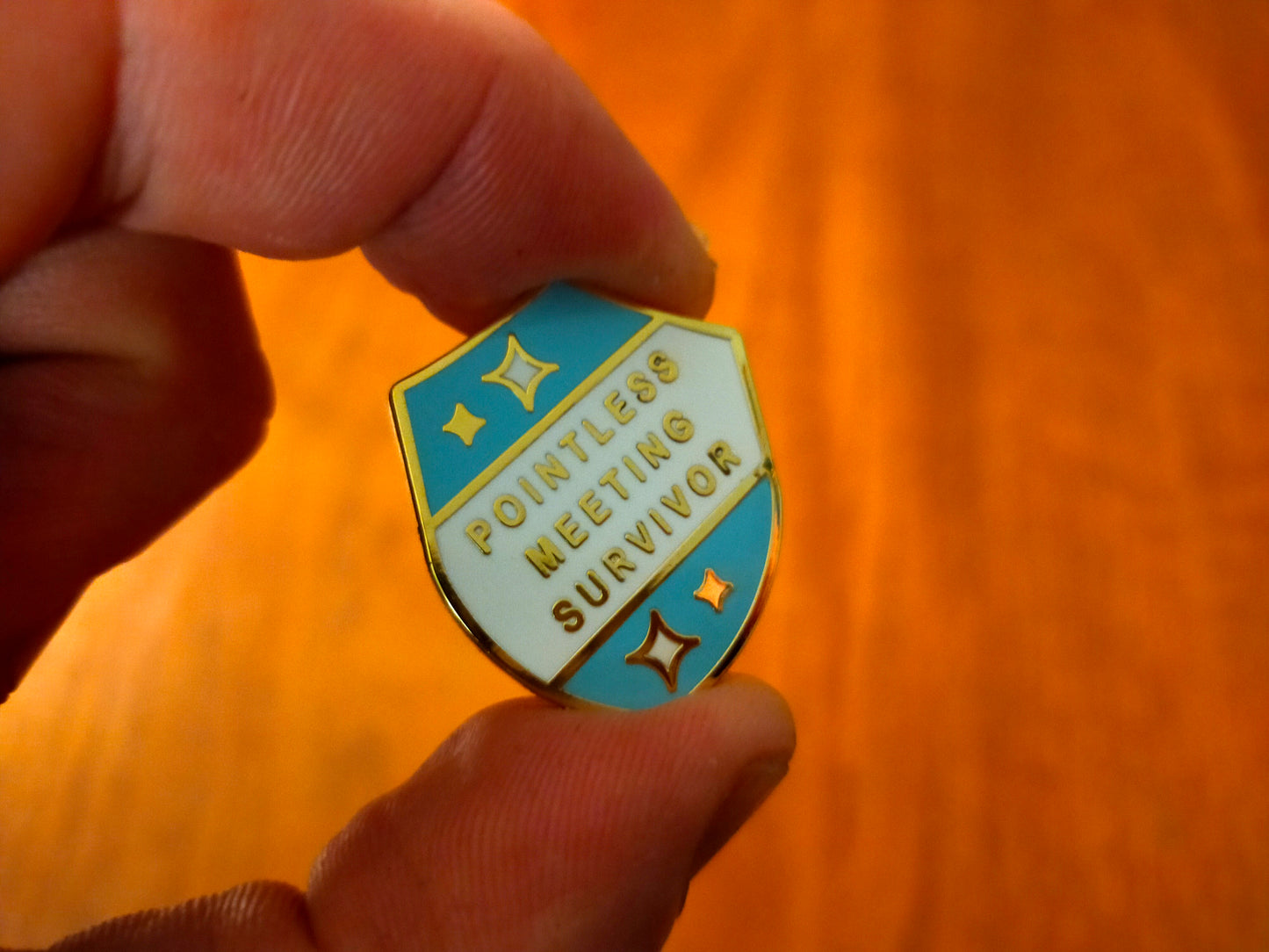 Pointless meeting badge pin